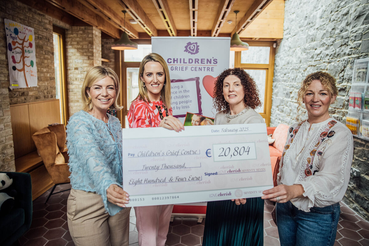 Maeve and Tara presenting the cheque to Mairead O’Keefe, CEO, and Carol Fitzgough, fundraising, both from the Childrens Grief Centre in Limerick. Picture: Brian Arthur