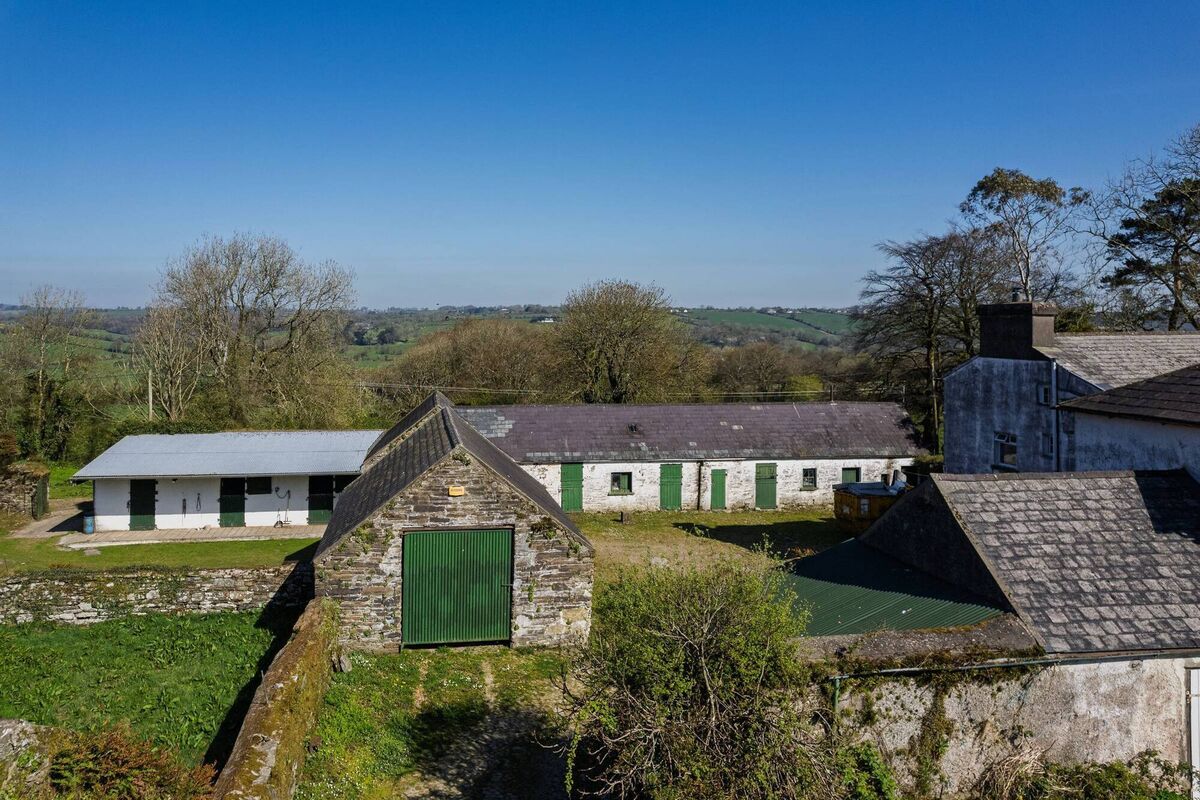 Courtyard, barn and outbuildings are a throwback to the past, and have been very well kept