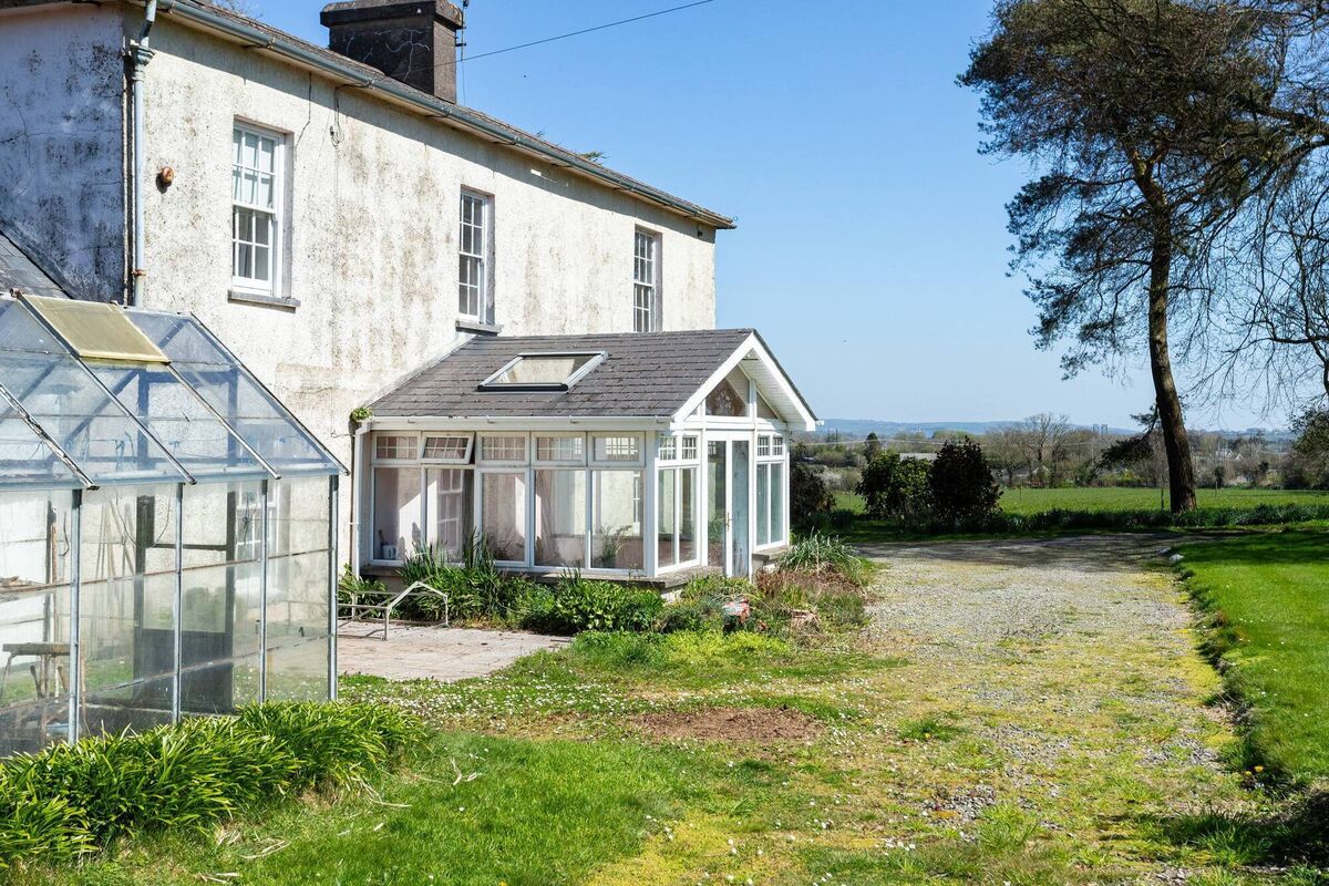 Side aspect with sun room