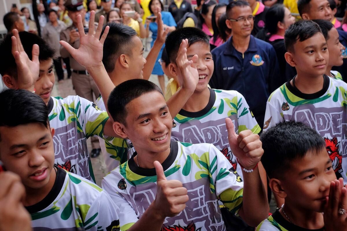 The boys after their dramatic rescue. The children were the true heroes of the story, Jim says. Picture: Linh Pham/Getty Images