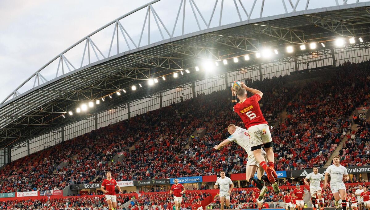 LIKE A SALMON: Munster’s Peter O’Mahony scores his side’s sixth try despite Nathan Doak of Ulster. Pic: James Crombie/Inpho