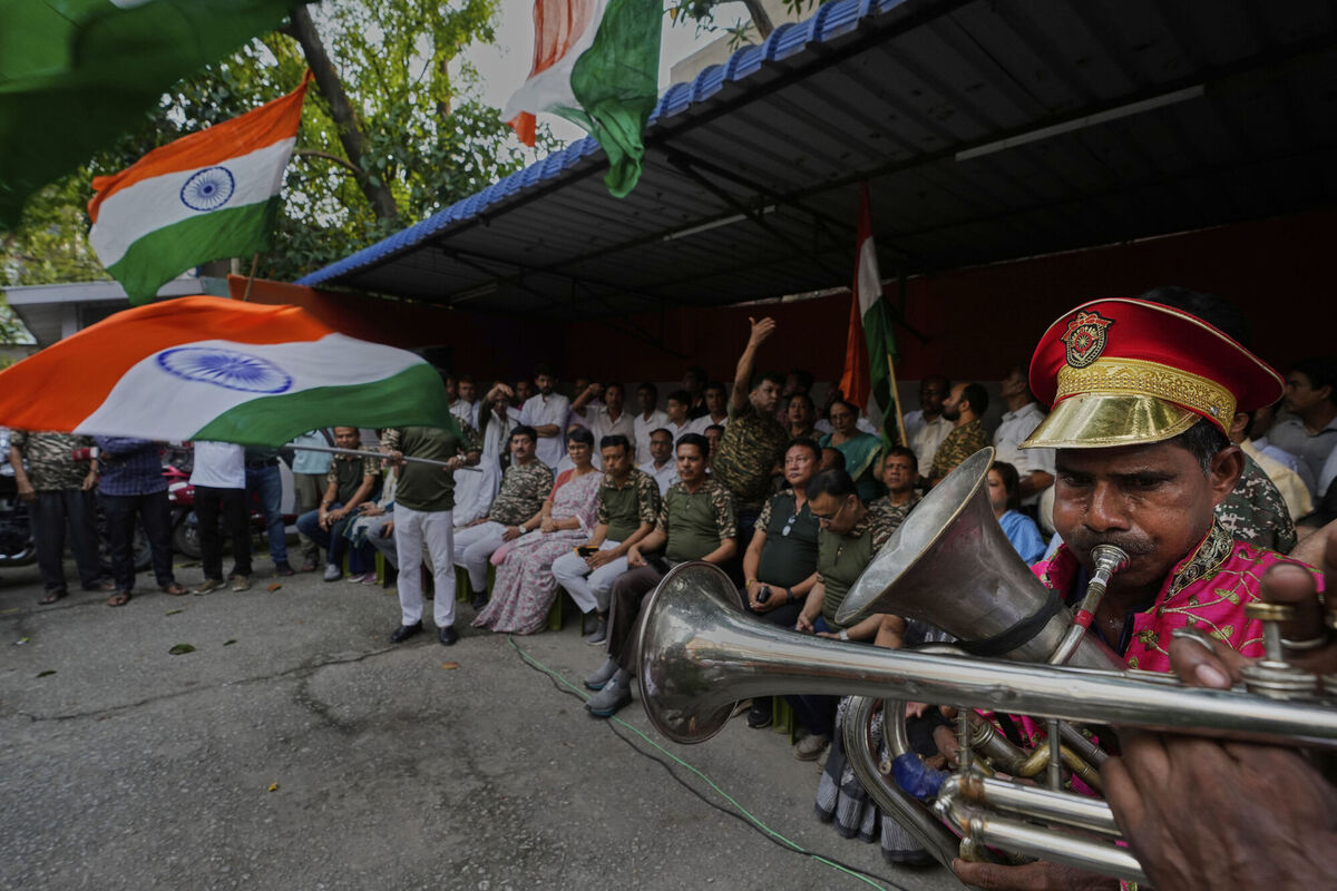 Indian National Congress workers hold Indian national flags in support of the Indian Army as they celebrate the success of 'Operation Sindoor', strike against Pakistan, in Guwahati, India, Friday, May 9, 2025. (AP Photo/Anupam Nath)
