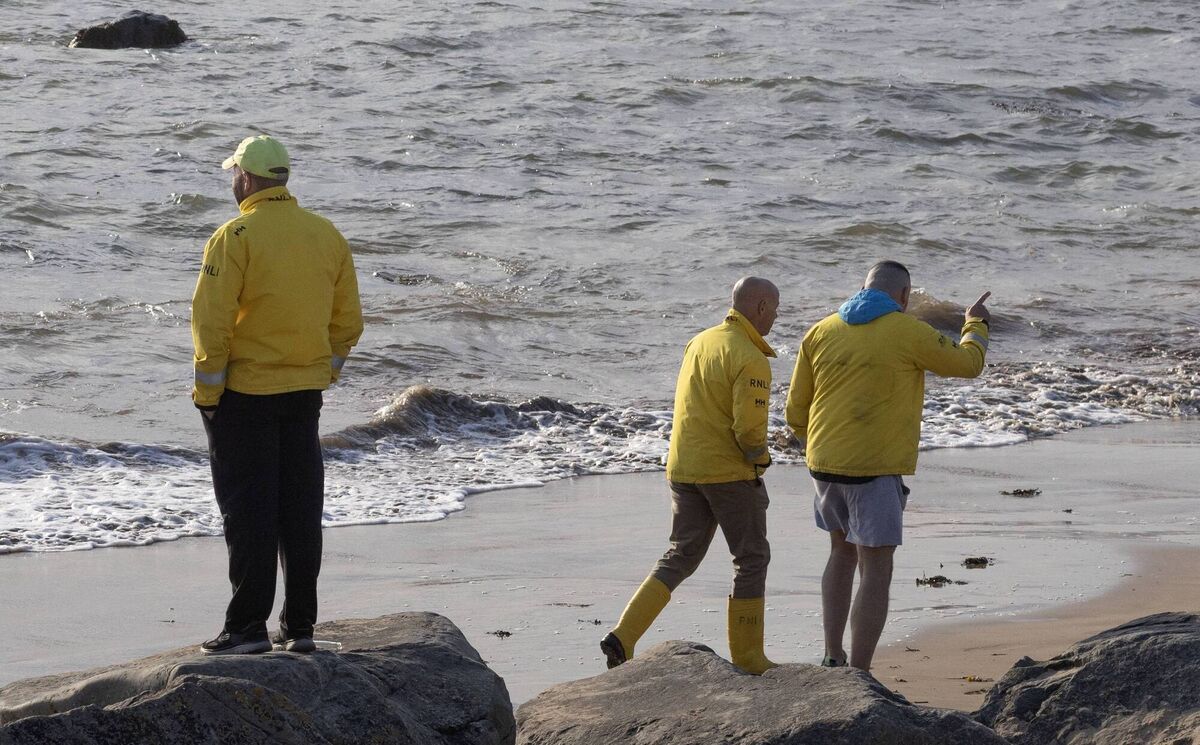 Members of the local coastguard searching the coastline at Buncrana. Picture: North West Newspix