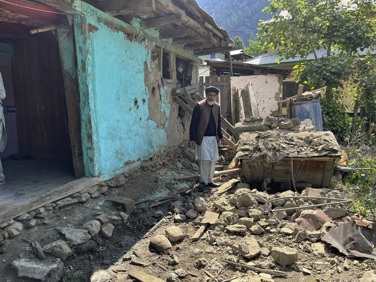 A Kashmiri villager examines the damage caused  to his house by Indian shelling in Neelum Valley, a district of Pakistan-administered Kashmir on Saturday. Photo: AP/M.D. Mughal