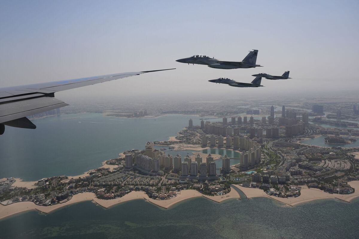 Qatar Emiri Air Force F-15s provide an honorary escort for Air Force One, carrying President Donald Trump, as it arrives in Doha, Qatar, Wednesday, May 14, 2025. (AP Photo/Alex Brandon)