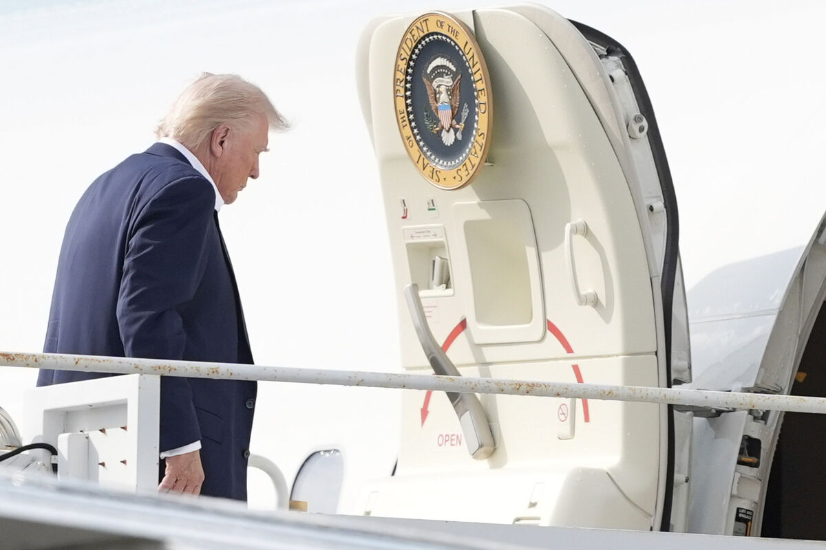 President Donald Trump boards Air Force One at Palm Beach International Airport, Sunday, May 4, 2025, in West Palm Beach, Fla. (AP Photo/Manuel Balce Ceneta)