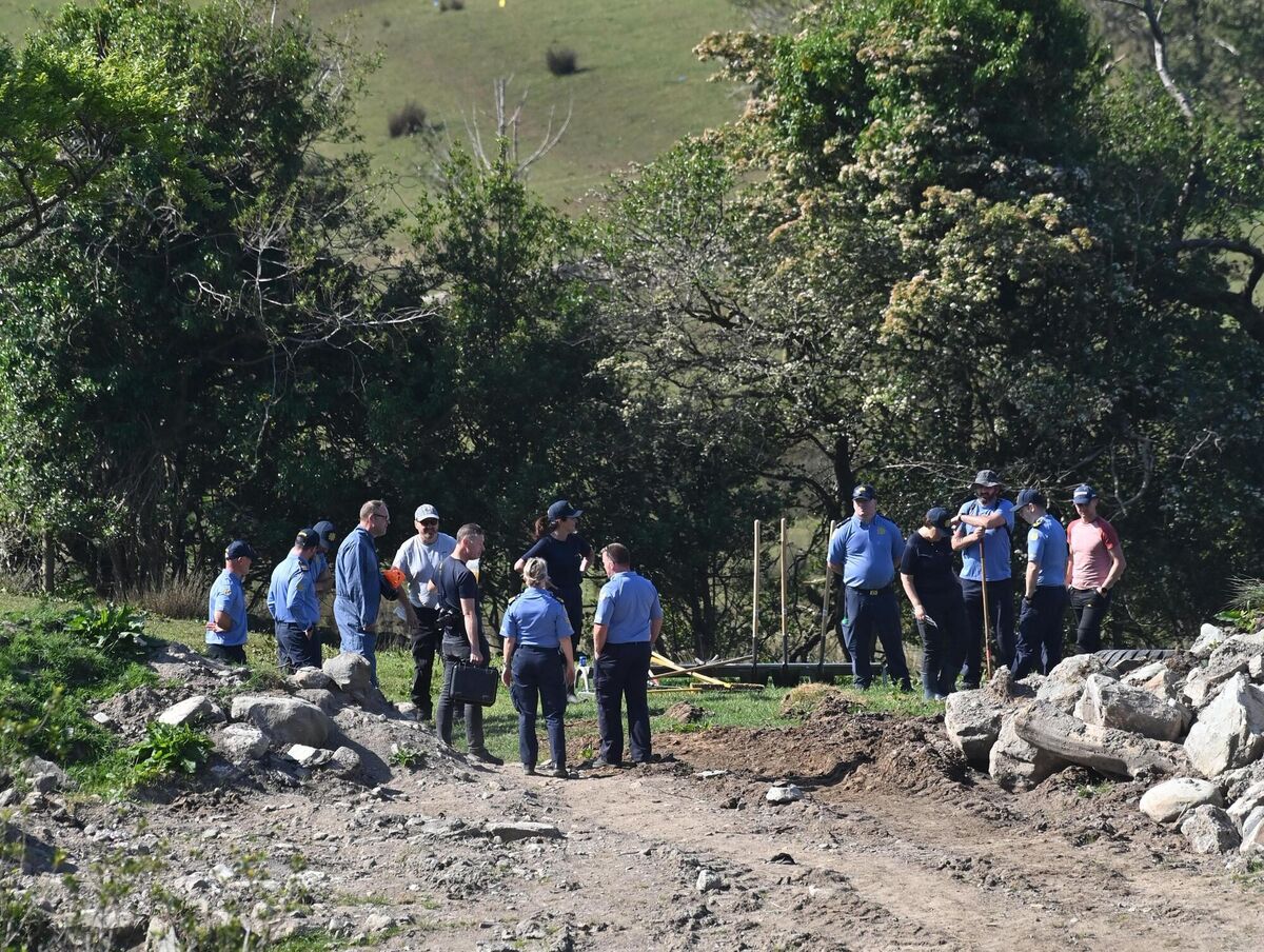  Members of the Forensic and Technical Bureau on the farm of Michael Gaine on Sunday. Picture: Dan Linehan