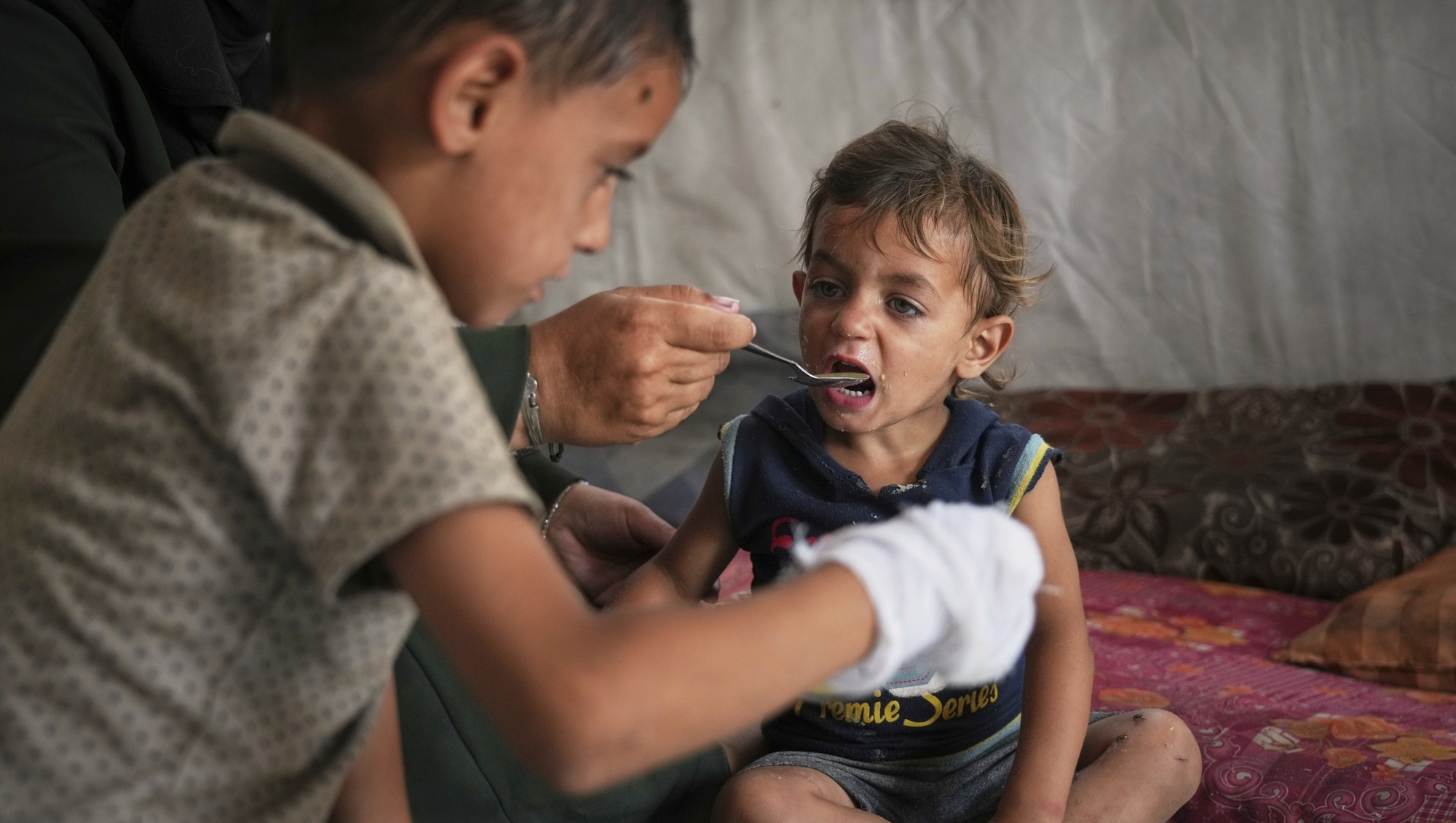 UN official says 20 aid trucks with food are waiting to enter Gaza
