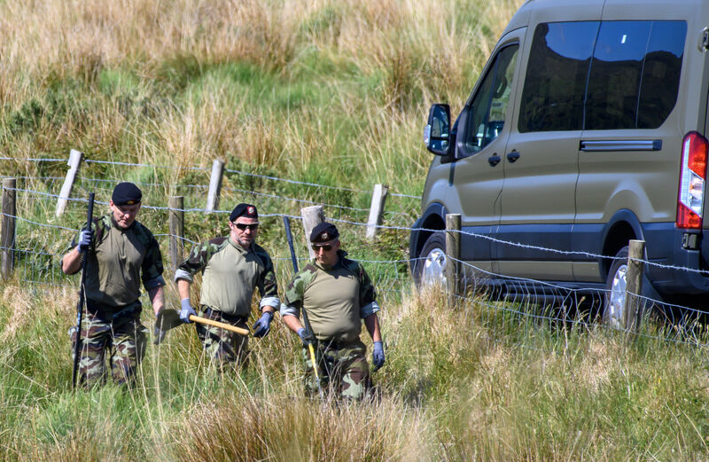  Army walking throung a farm where they started a search 1km below Michael Gain's farm at Carrig East, Kenmare, Co Kerry. Picture Dan Linehan