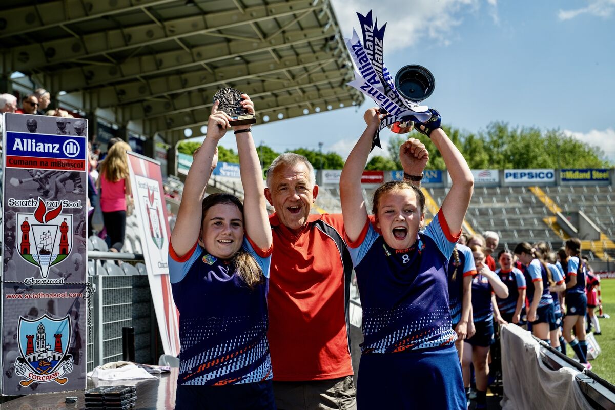 Lyla Reville McCarthy and Sophie Kenny celebrate as they are presented with the cup.