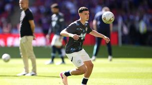 <p>Manchester City’s Phil Foden warming up ahead of the FA Cup final (Nick Potts/PA)</p>