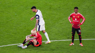 <p>Tottenham Hotspur's Cristian Romero consoles Manchester United's Alejandro Garnacho after the Europa League final. Pic: Andrew Milligan/PA Wire.</p>