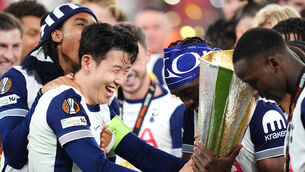 <p>Tottenham Hotspur’s Son Heung-Min with the trophy following the UEFA Europa League final (Adam Davy/PA)</p>