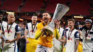 Tottenham goalkeeper Guglielmo Vicario celebrates with the Europa League trophy (Adam Davy/PA)