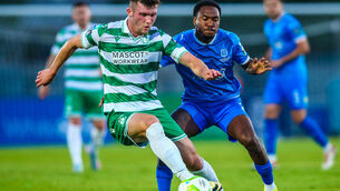 <p>HOOP DREAMS: Shamrock Rovers’ Josh Honohan holds off Waterford's Navajo Bakboord. Pic: INPHO/Ken Sutton</p>