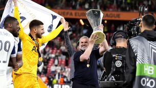 <p>PROMISES KEPT: Tottenham Hotspur manager Ange Postecoglou celebrates with the trophy in front of the fans after the final whistle in the UEFA Europa League final at the Estadio de San Mames in Bilbao, Spain. Pic: Nick Potts/PA Wire</p>