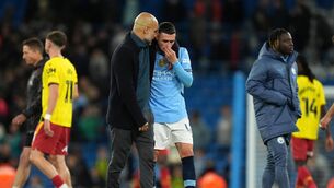 <p>Pep Guardiola, left, has promised to help Phil Foden through a tough time (Martin Rickett/PA)</p>