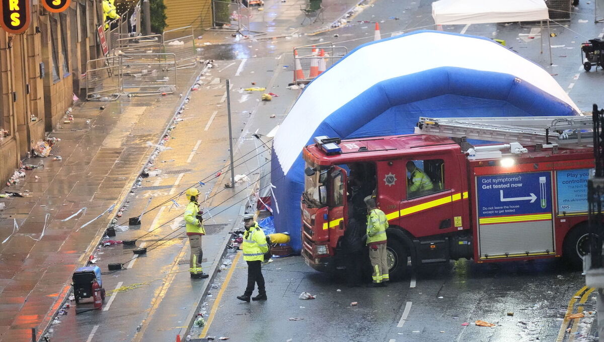 Police and emergency personnel dealing with a road traffic collision on Water Street near the Liver Building in Liverpool after a car collided with pedestrians during the Premier League winners parade. Picture: Danny Lawson/PA Wire