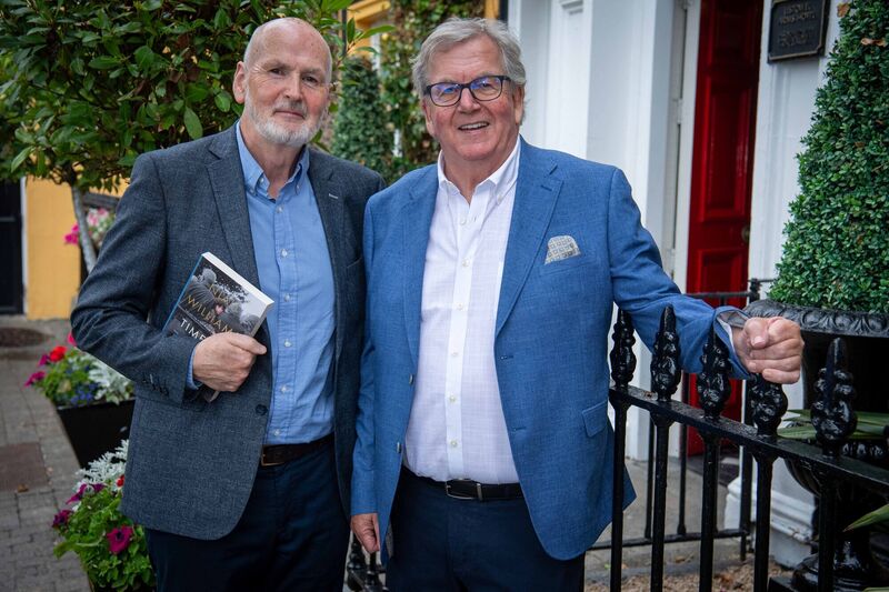 Niall Williams, winner of the 2025 Kerry Group Irish Novel of the Year Award for his novel Time of the Child,  pictured with the winner is Ned O'Sullivan Writers Week. Picture: Domnick Walsh © Eye Focus LTD.