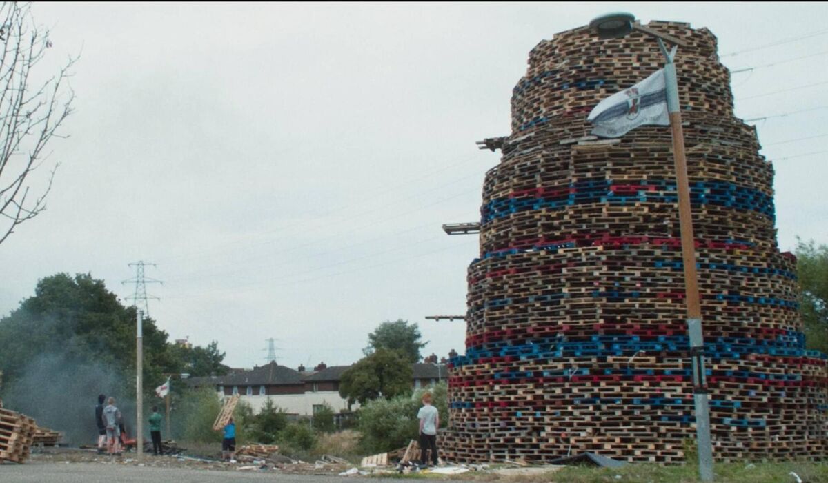 Preparations for a bonfire in Belfast, in a scene from The Flats. Preparations for a bonfire in Belfast, in a scene from The Flats.