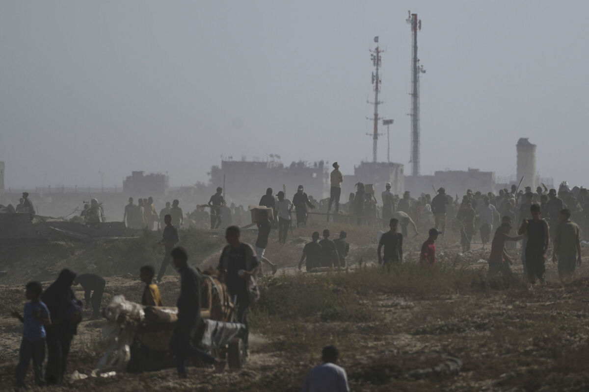 Palestinians heading to receive food and humanitarian aid packages from the Gaza Humanitarian Foundation, a US-backed group approved by Israel, in Rafah, southern Gaza Strip on Tuesday, May 27, 2025. (AP Photo/Abdel Kareem Hana)