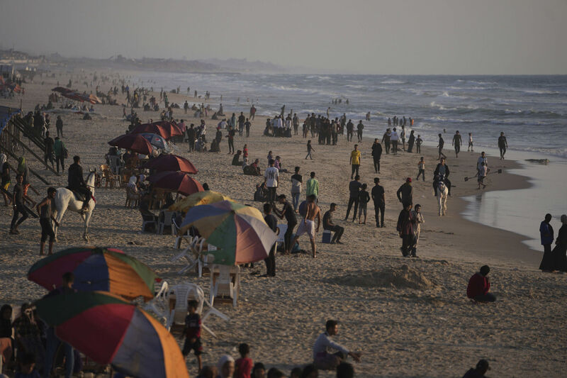 Palestinians walk on the Gaza shore near the port of Gaza City, Thursday, May 29, 2025. File picture: Jehad Alshrafi/AP Palestinians walk on the Gaza shore near the port of Gaza City, Thursday, May 29, 2025. File picture: Jehad Alshrafi/AP