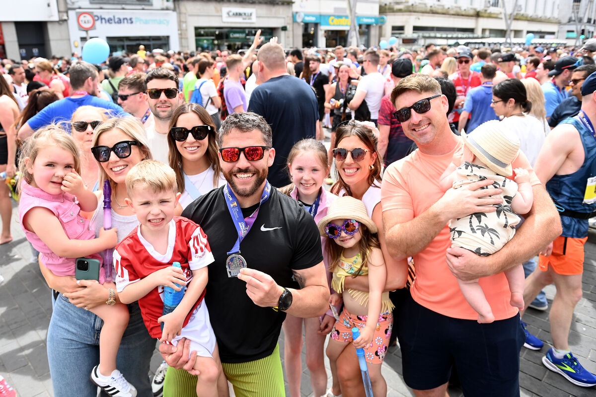  Leon Lynch, Douglas and family supporters at the finish line of the Cork City Marathon on Sunday 2nd June 2024. Picture: Larry Cummins