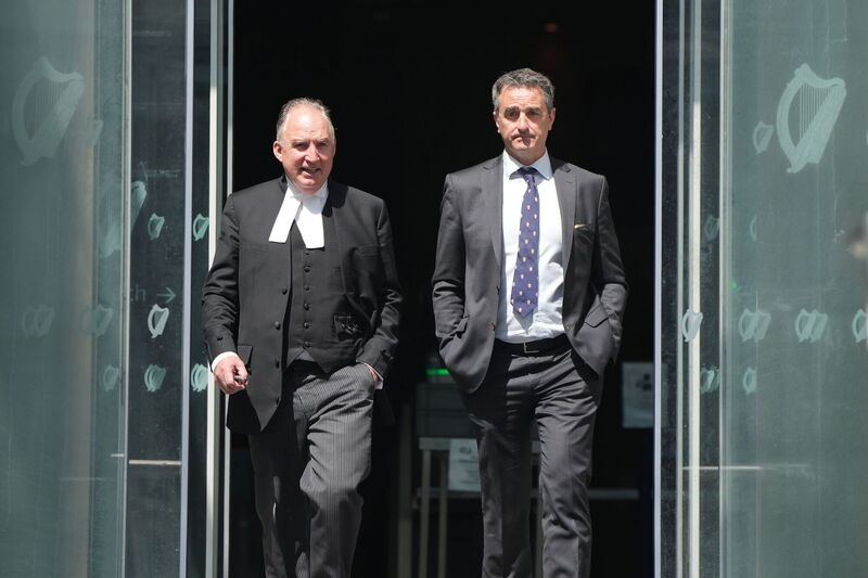 Richard Satchwell's Senior council Brendan Grehan (left) and solicitor Eddie Burke. Mr Grehan had sought the discharge of the jury on foot of instructions from his client. Photo: Niall Carson/PA