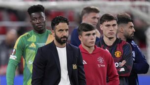 <p>Manchester United's head coach Ruben Amorim with his squad. Pic: AP Photo/Bernat Armangue.</p>
