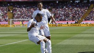 <p>Real Madrid's Kylian Mbappe, front, and Jude Bellingham. Real made €1bn last season. Picture: AP Photo/Joan Monfort</p>