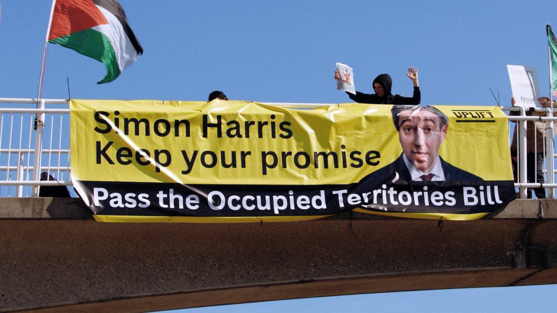 Activists drop banners recently across Dublin and Wicklow calling on Simon Harris to pass the Occupied Territories Bill. A national demo for peace and neutrality is taking place in Dublin on June 14.