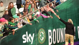 <p>Republic of Ireland head coach Carla Ward greets fans in the stands. Pic: Niall Carson/PA Wire.</p>