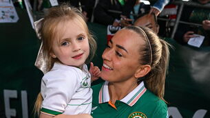 <p>Republic of Ireland captain Katie McCabe with Darcy Murphy, age 5, from Ballyphehane in Cork. Pic: Stephen McCarthy/Sportsfile</p>