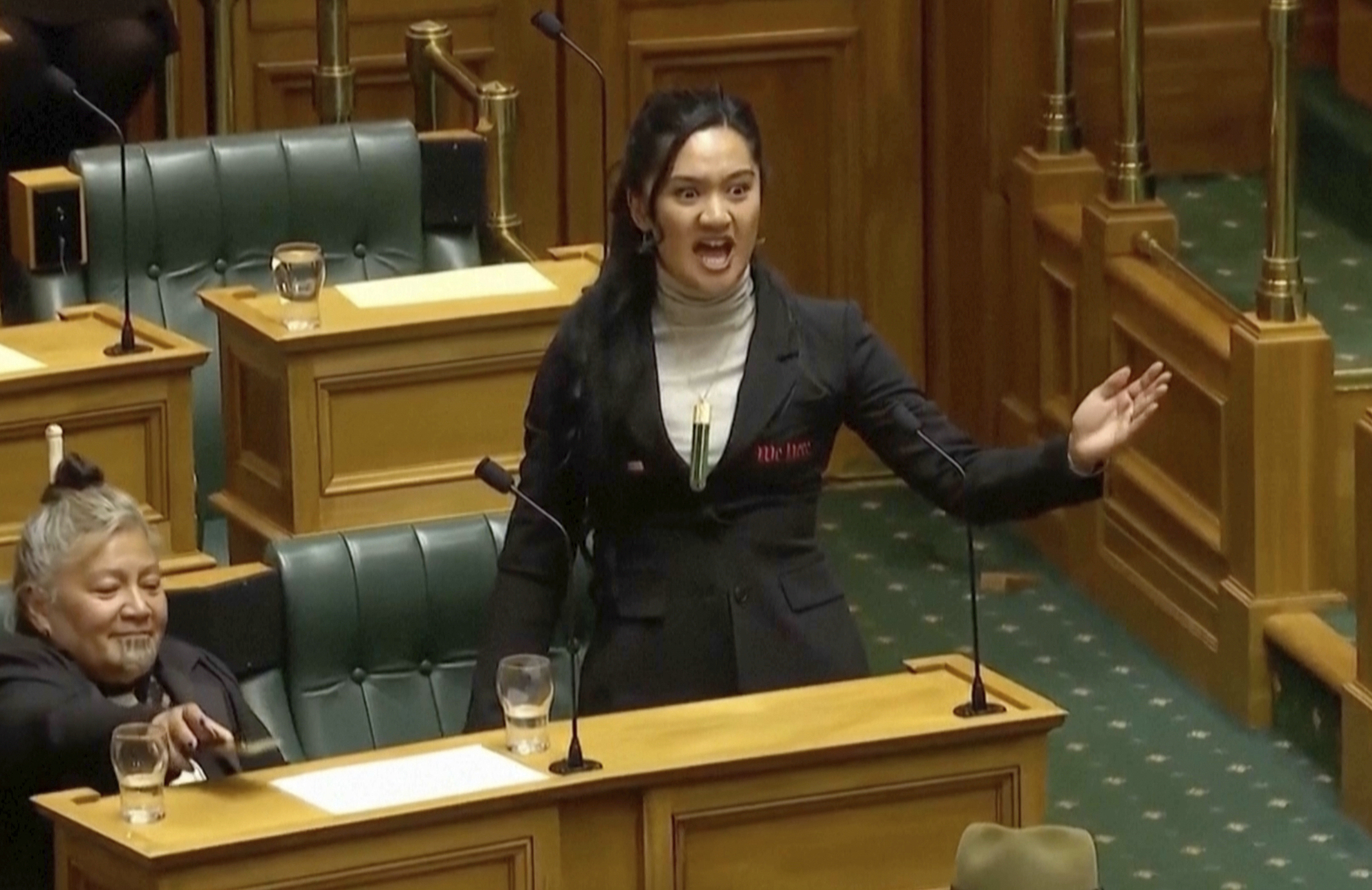 New Zealand parliament suspends three Maori Party politicians over haka protest