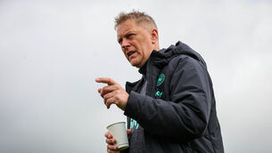<p>TALL ORDER: Republic of Ireland manager Heimir Hallgrímsson enjoys a coffee during squad training on Thursday. Pic: INPHO/Ryan Byrne</p>