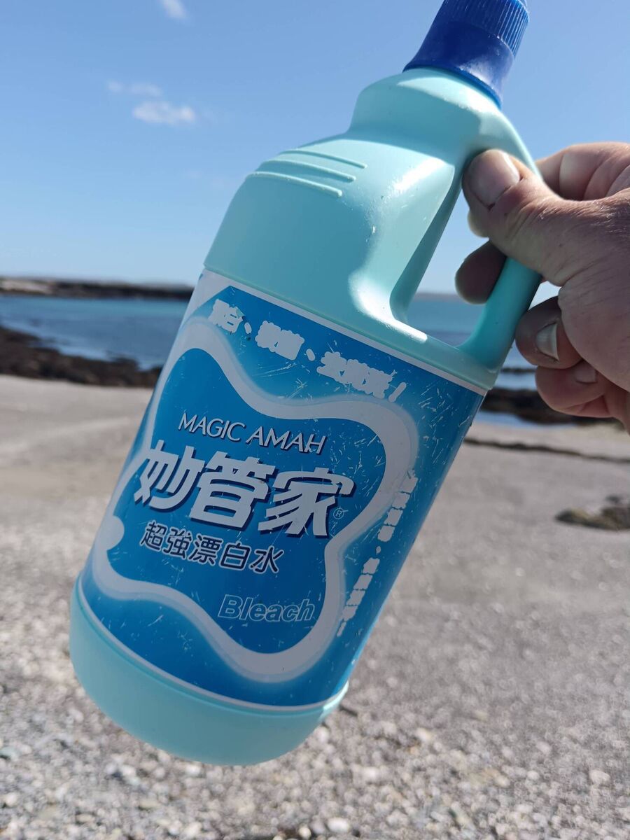 Mark says he finds items that wash up from all over the world: 'The other day I picked up a bottle of bleach from Taiwan.' Picture: Mark McCarthy Mark says he finds items that wash up from all over the world: 'The other day I picked up a bottle of bleach from Taiwan.' Picture: Mark McCarthy