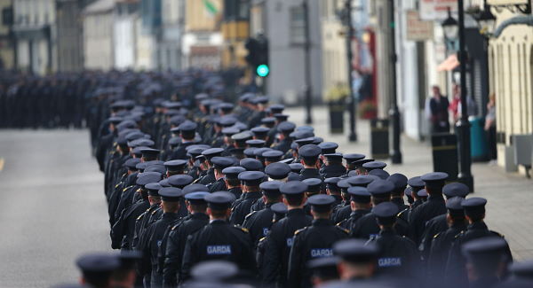 The funeral procession of Garda Tony Golden passes through Blackrock village