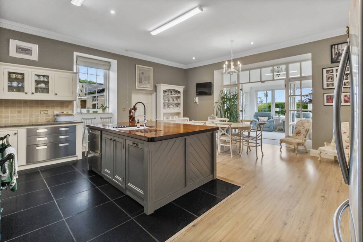 Great big kitchen which opens to the sun room