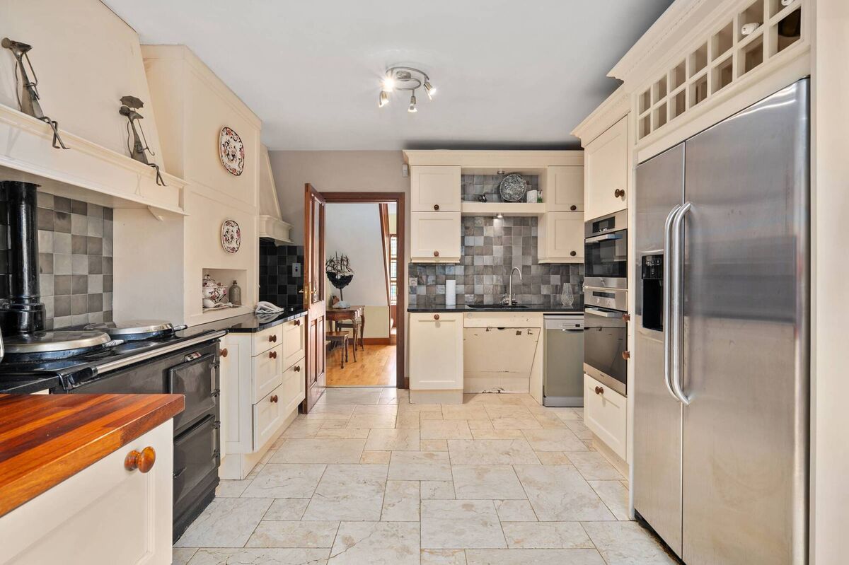 Aga can? Kitchen with Aga, painted units, hardwood tops and overhead rooflights Aga can? Kitchen with Aga, painted units, hardwood tops and overhead rooflights