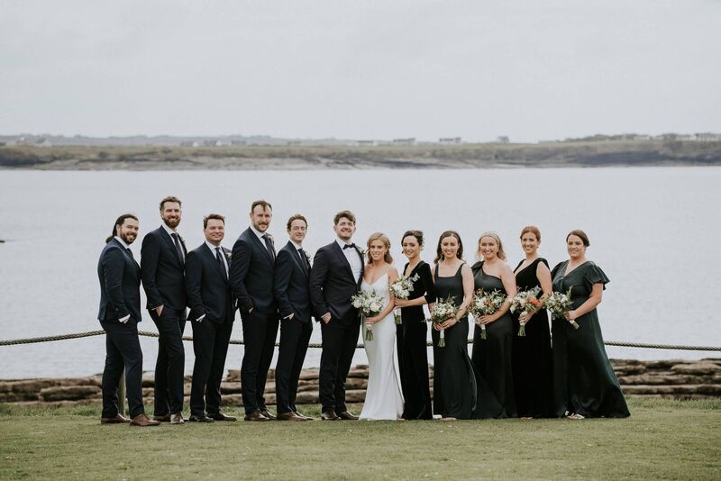 Megan Lawlor and James Ensor with their wedding party. Pictures: Awake and Dreaming Megan Lawlor and James Ensor with their wedding party. Pictures: Awake and Dreaming