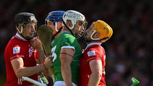 <p>Aaron Gillane of Limerick and Niall O'Leary of Cork, right, and Eoin Downey of Cork and Alan Connolly of Cork tussle at TUS Gaelic Grounds. Pic: Brendan Moran/Sportsfile</p>