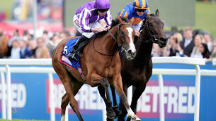 <p>DIGGING IN: Minnie Hauk gets the better of stablemate Whirl ton win the Betfred Oaks at Epsom on Friday. 	Picture: Adam Davy/PA </p>