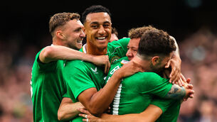 <p>Ireland’s Kasey McAteer celebrates scoring against with Adam Idah and Robbie Brady. Pic: ©INPHO/Ryan Byrne</p>