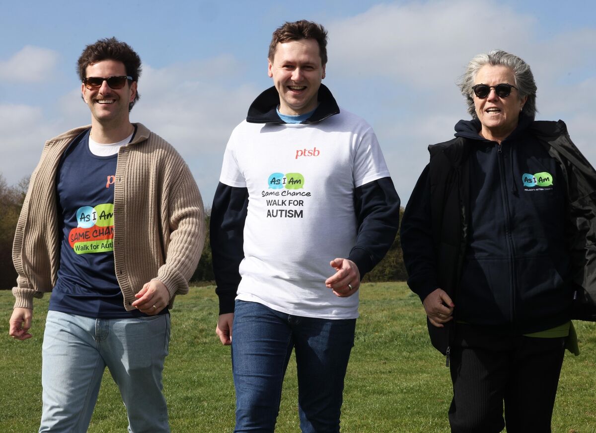 Actress and comedian Rosie O'Donnell on right walks with Adam Harris is the Founder and CEO of AsIAm and Eric Roberts Social Media Star joined hundreds of people attending the AsIAm Same Chance - Walk for Autism in Dublin at Dublin's Malahide Castle. Picture:Leon Farrell/Photocall Ireland