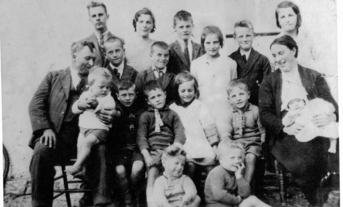 Margaret (Maggie) Lynch and her husband William with 16 of their children in 1933. Picture: courtesy of Jim Driscoll