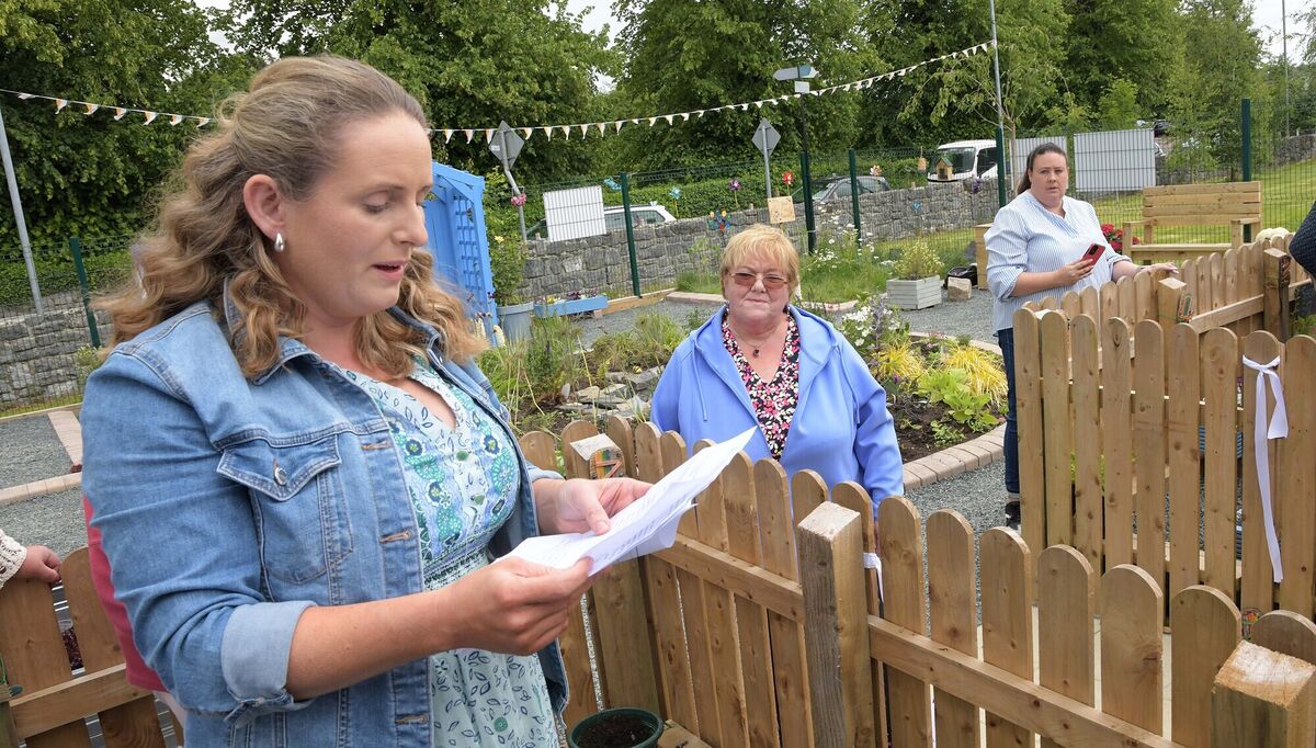 Principal Jennifer Murphy speaking to visitors at the opening of the garden Liz's late husband John Dooley donated to the school. Picture: Moya Nolan