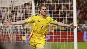 <p>Belgium's Kevin De Bruyne celebrates after scoring his side's winning goal against Wales. Pic: AP Photo/Geert Vanden Wijngaert)</p>