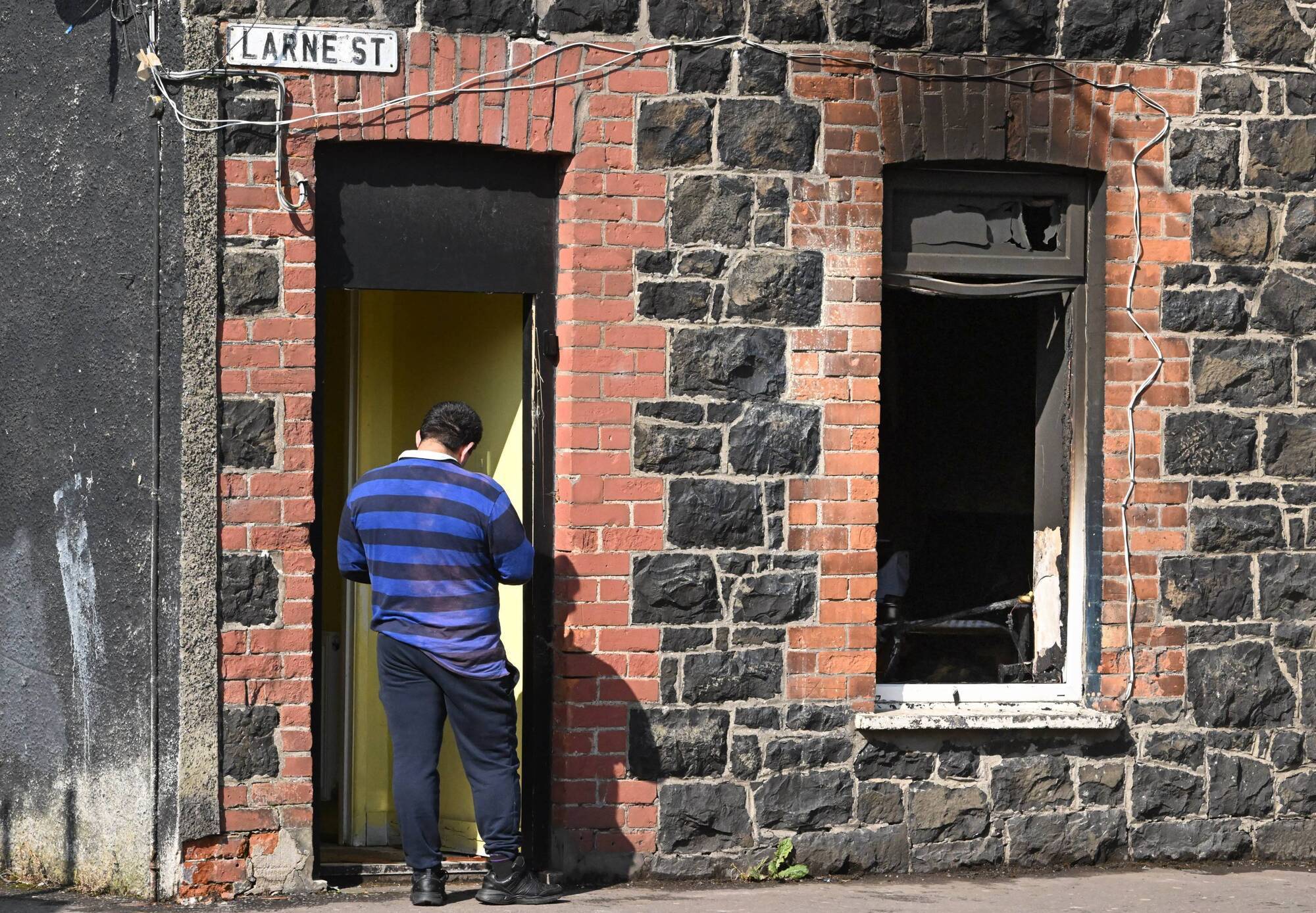 A burnt-out property in the Harryville area of Ballymena following scenes of violence on Monday night. Picture: Alan Lewis