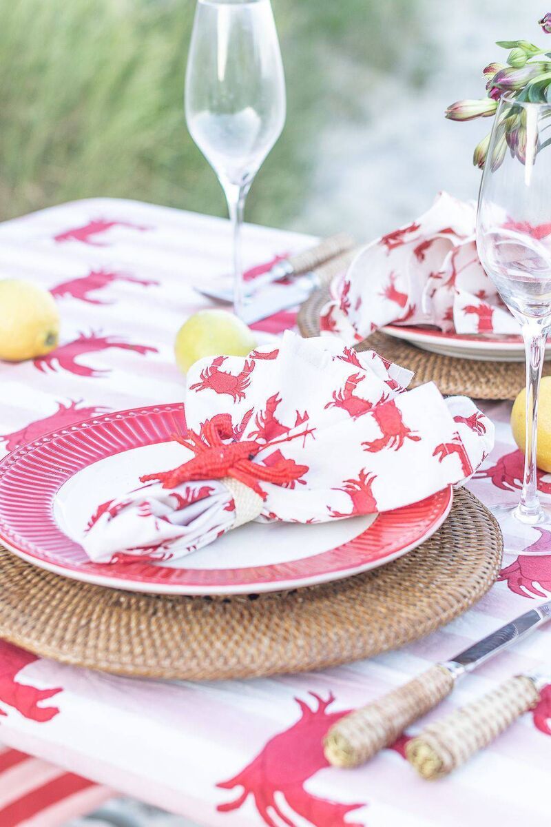 The Red Crab tablecloth with napkins injects subtle fun to a summer tabletop; tablecloth from €79.50, napkins, €39.50 for four. The Red Crab tablecloth with napkins injects subtle fun to a summer tabletop; tablecloth from €79.50, napkins, €39.50 for four.