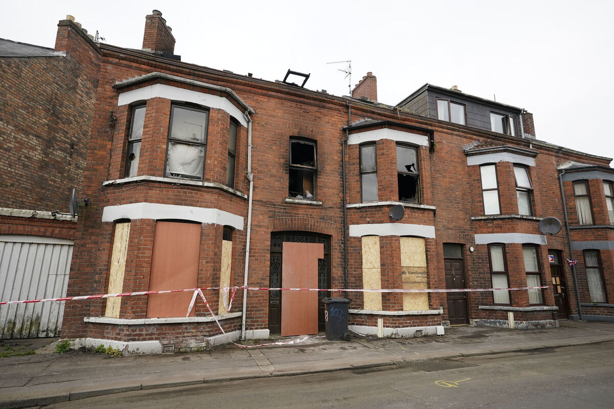 A burnt-out and boarded up property that was damaged on Monday evening in violence in Ballymena, during a protest over an alleged sexual assault in the Co Antrim town. Picture: Niall Carson/PA Wire